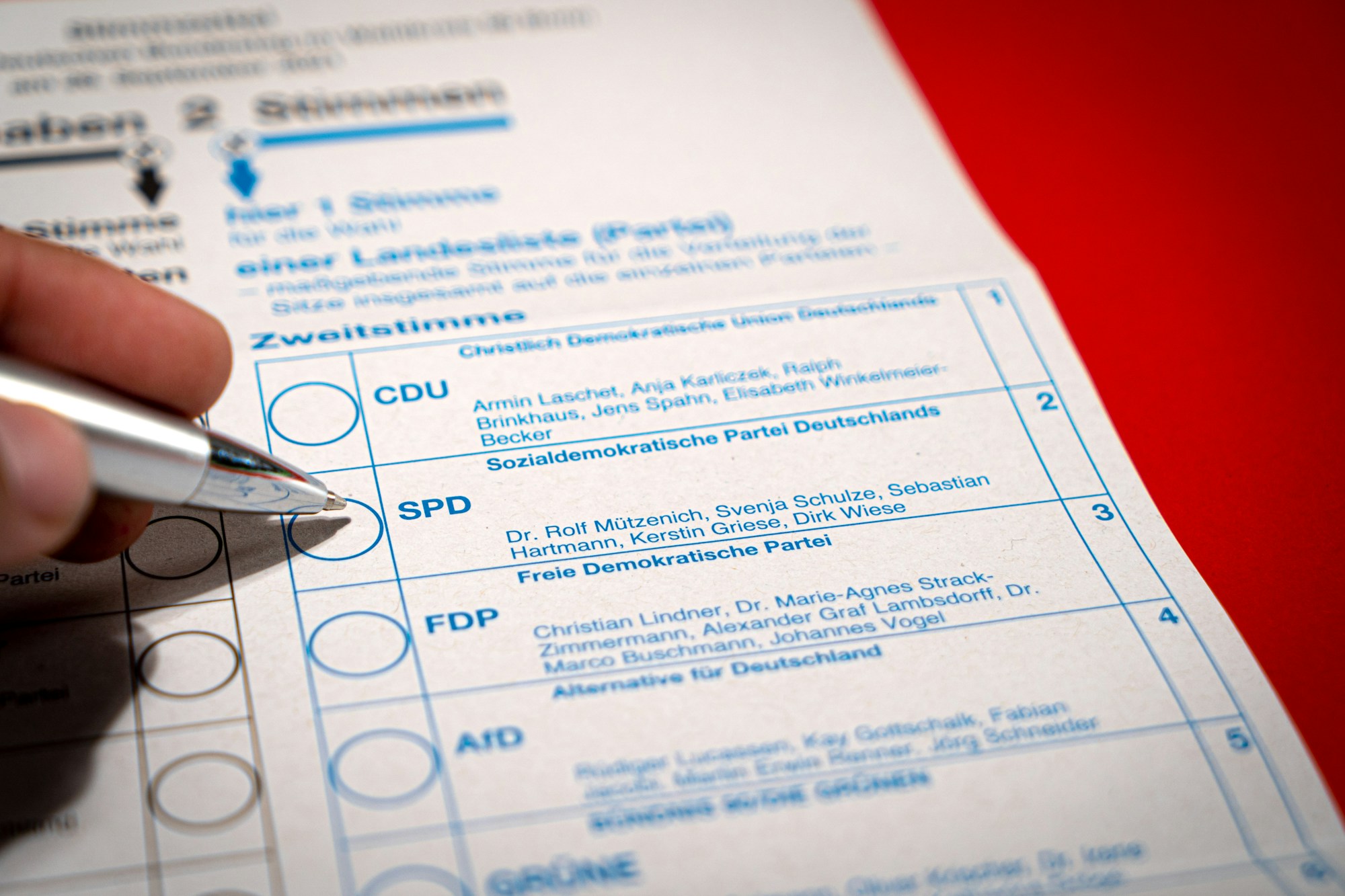 Person filling out an application form