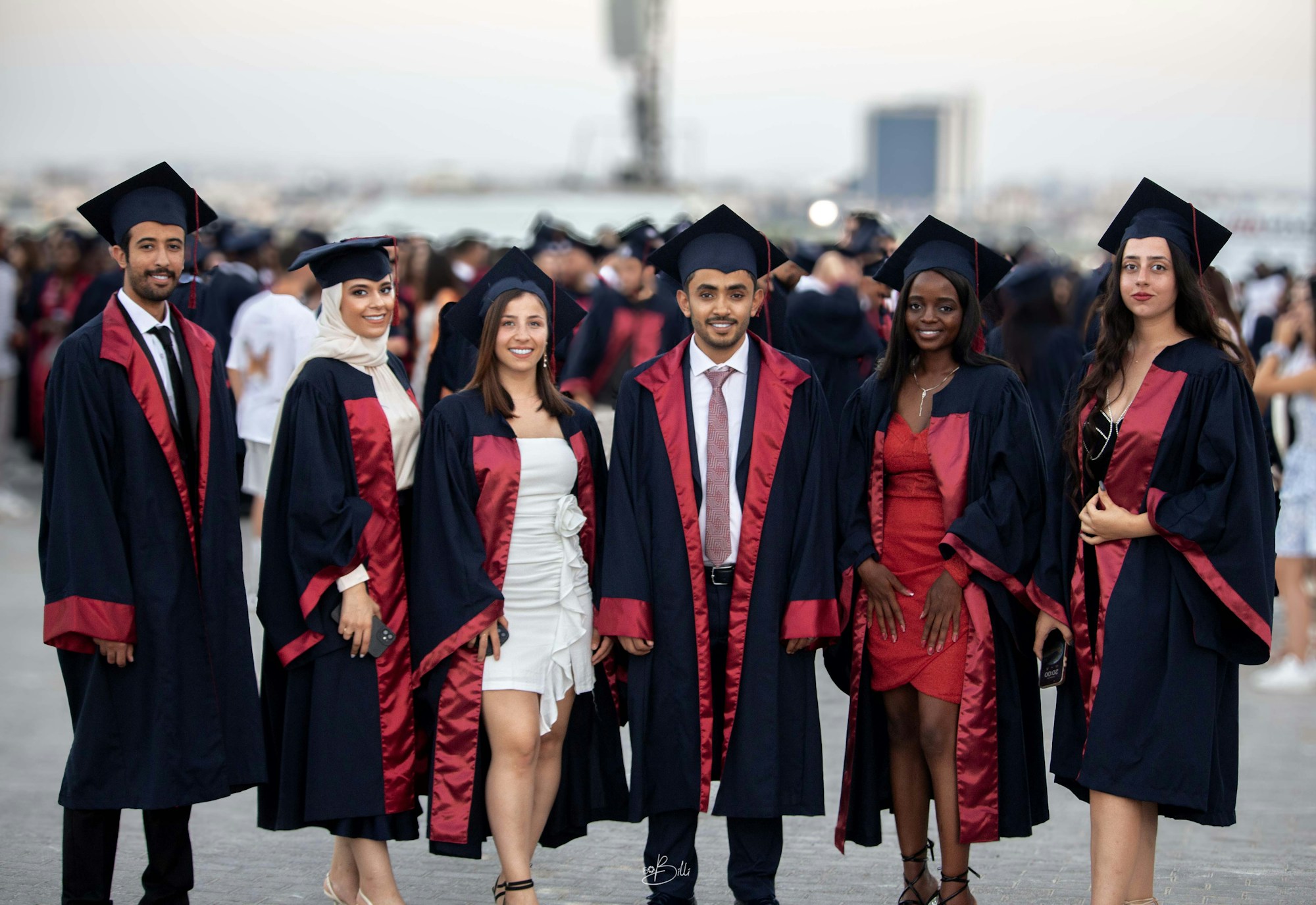 Alumni in graduation regalia
