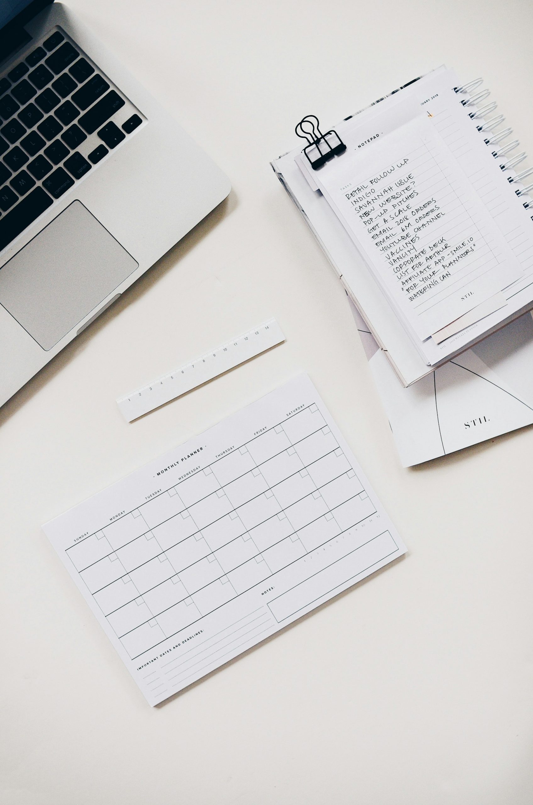 Laptop and notebook for budget planning