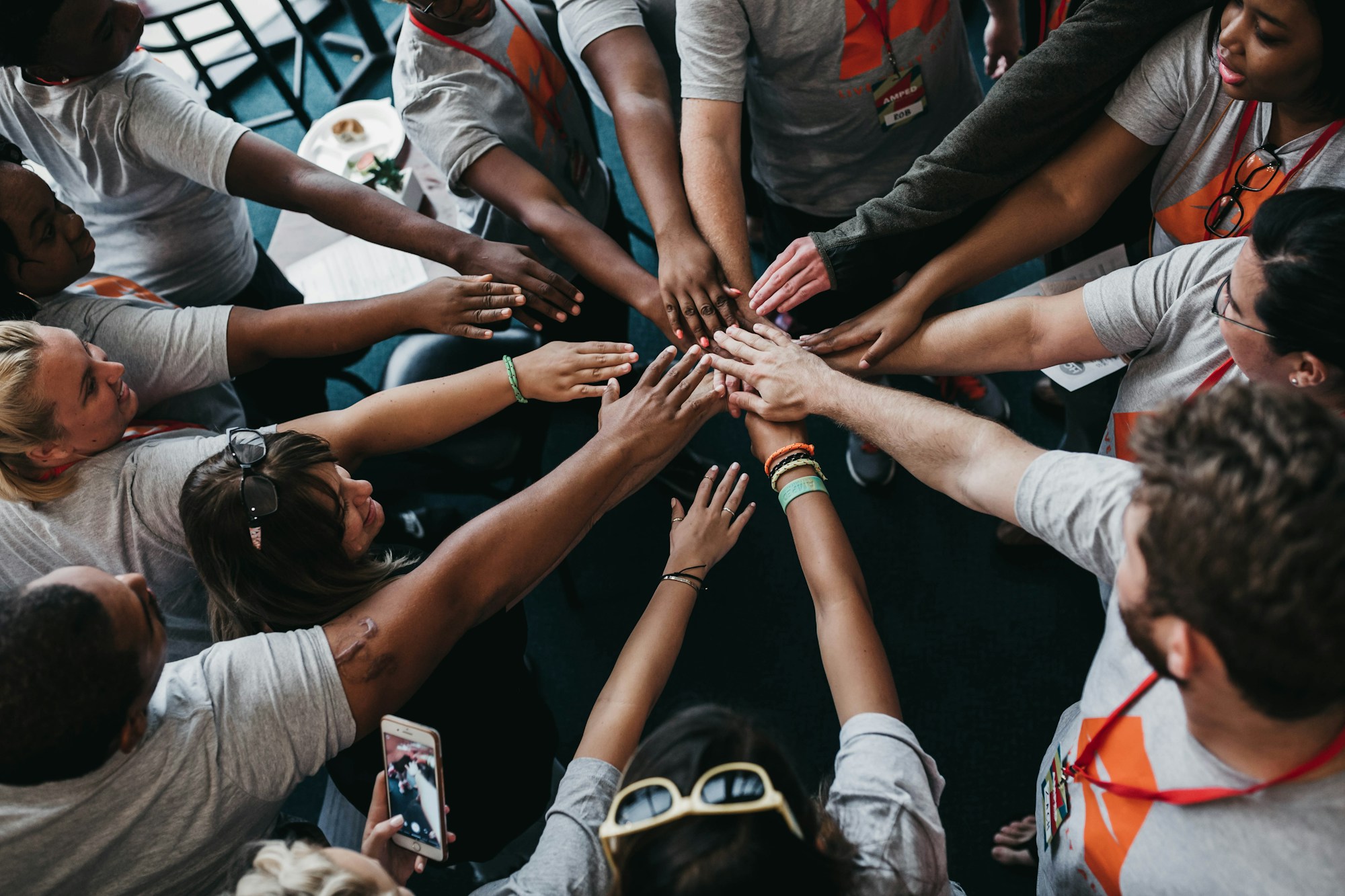 Hands gathered in the center