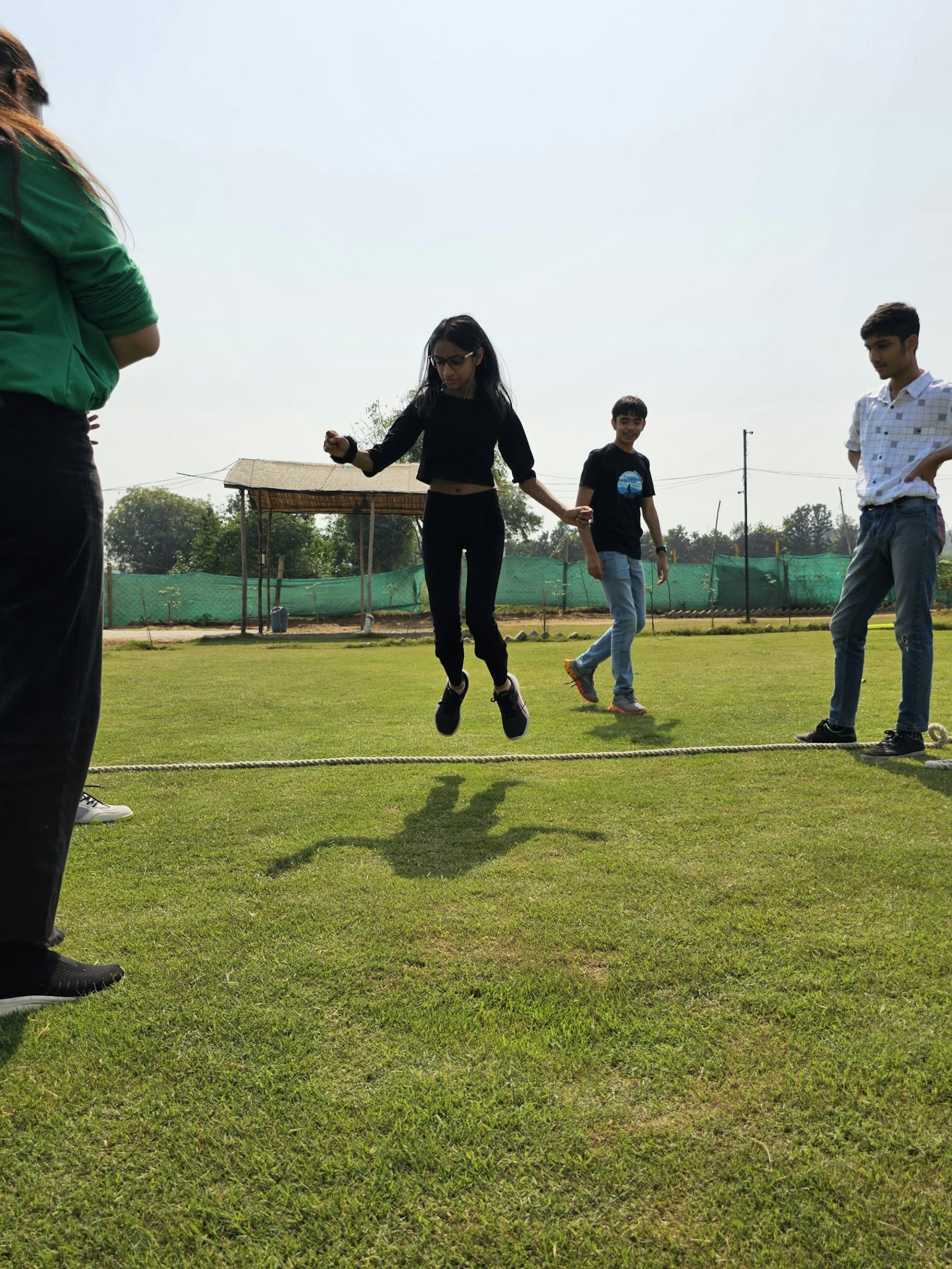 Group of students on a green field